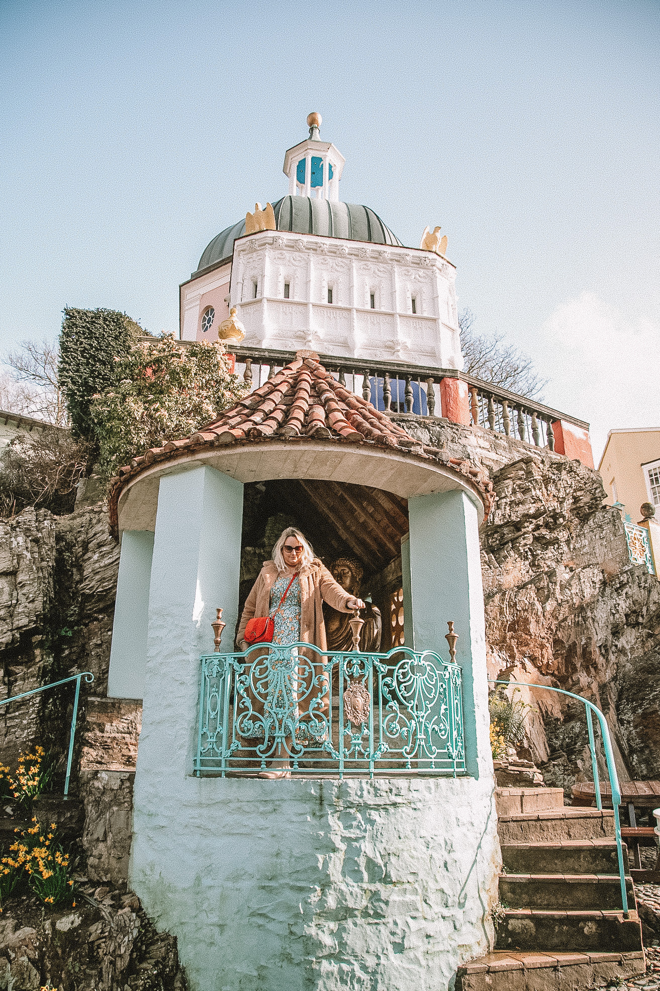 Lucy stood in a small stand in portmeirion