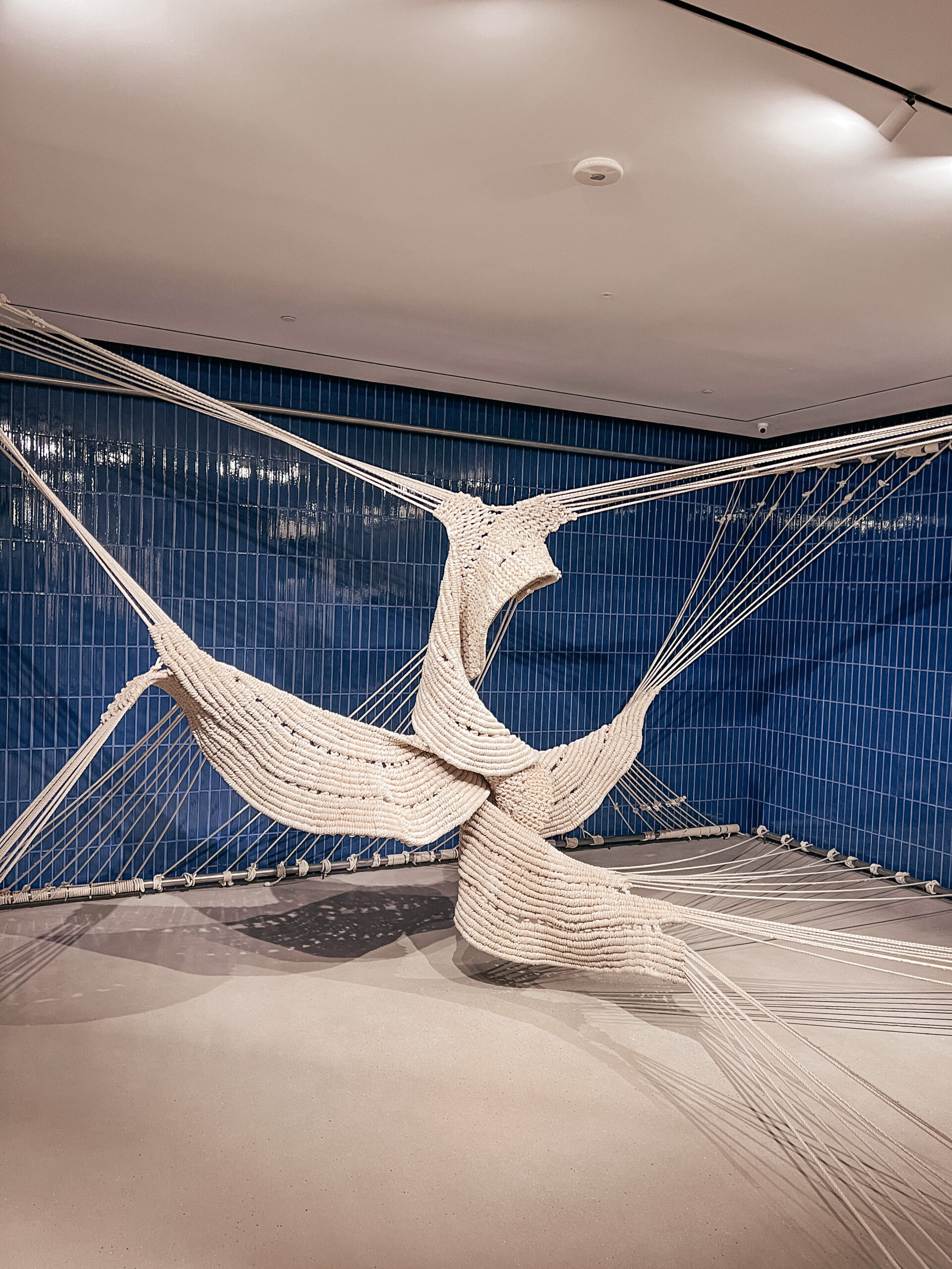 a macrame art installation in the loewe store