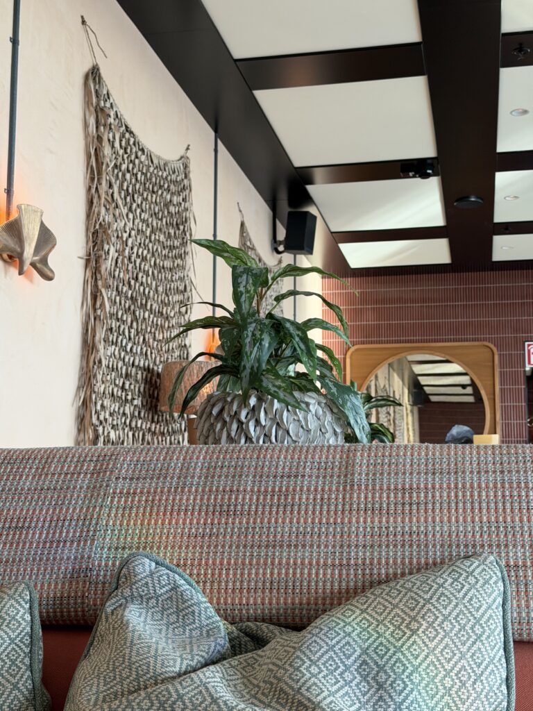 Poolside decor with woven wall hangings 