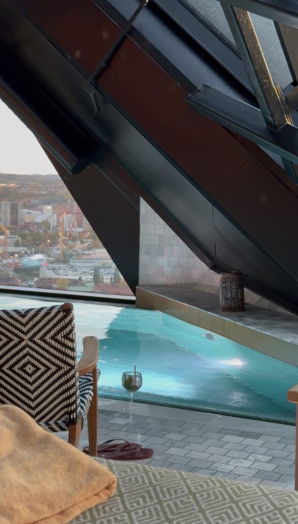 The top pool at Pachanga Pool Club and Spa with views out over the city